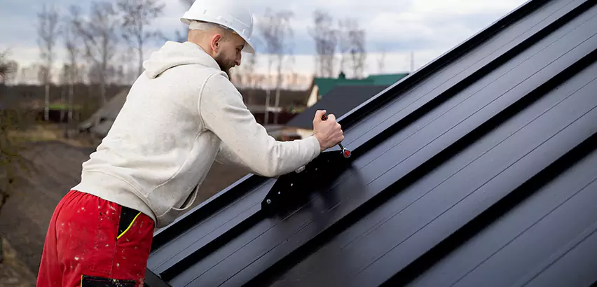 Tin Roof Ridge Cap Installation in Evanston
